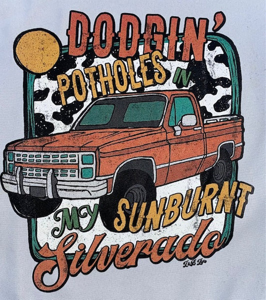DODGIN POTHOLES IN MY SUNBURNT SILVERADO