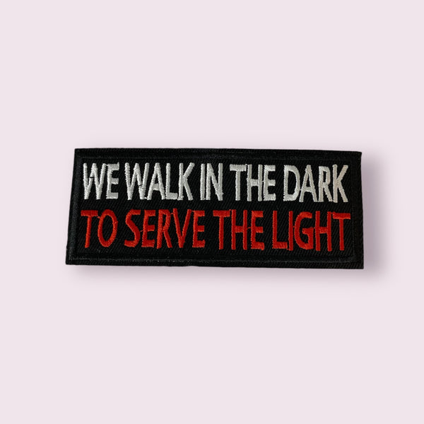 WE WALK IN THE DARK TO SERVE THE LIGHT HAT PATCH