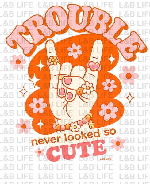 TROUBLE NEVER LOOKED SO CUTE